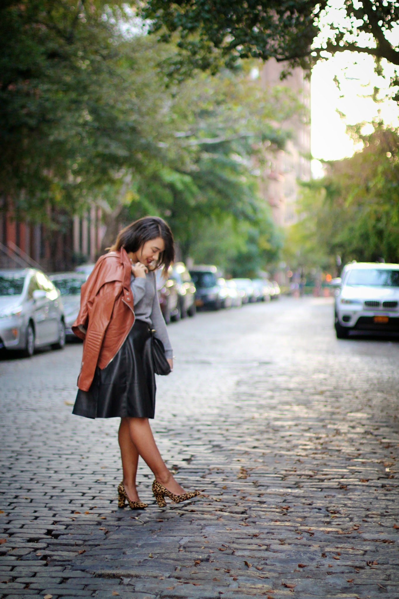 new york city fashion blogger new york blogger new york style blogger black fashion blogger fashion blogger new york fashion blogger black fashion blogger fall outfit fall look fall fashion fall style what to wear for fall fall fashion brown leather jacket coach brown leather jacket black midi skirt black midi leather skirt black leather midi skirt