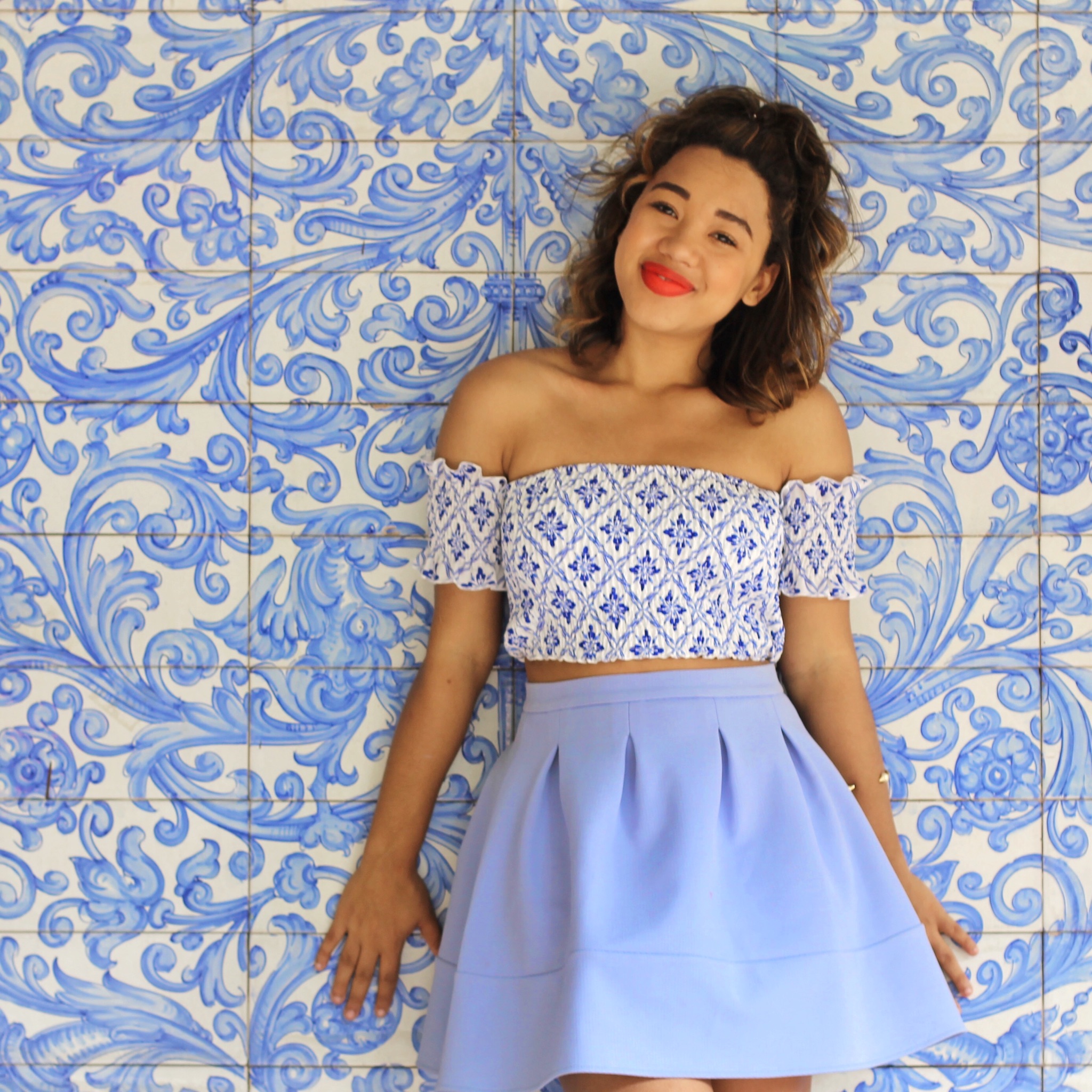 printed off the shoulder top and full blue skirt