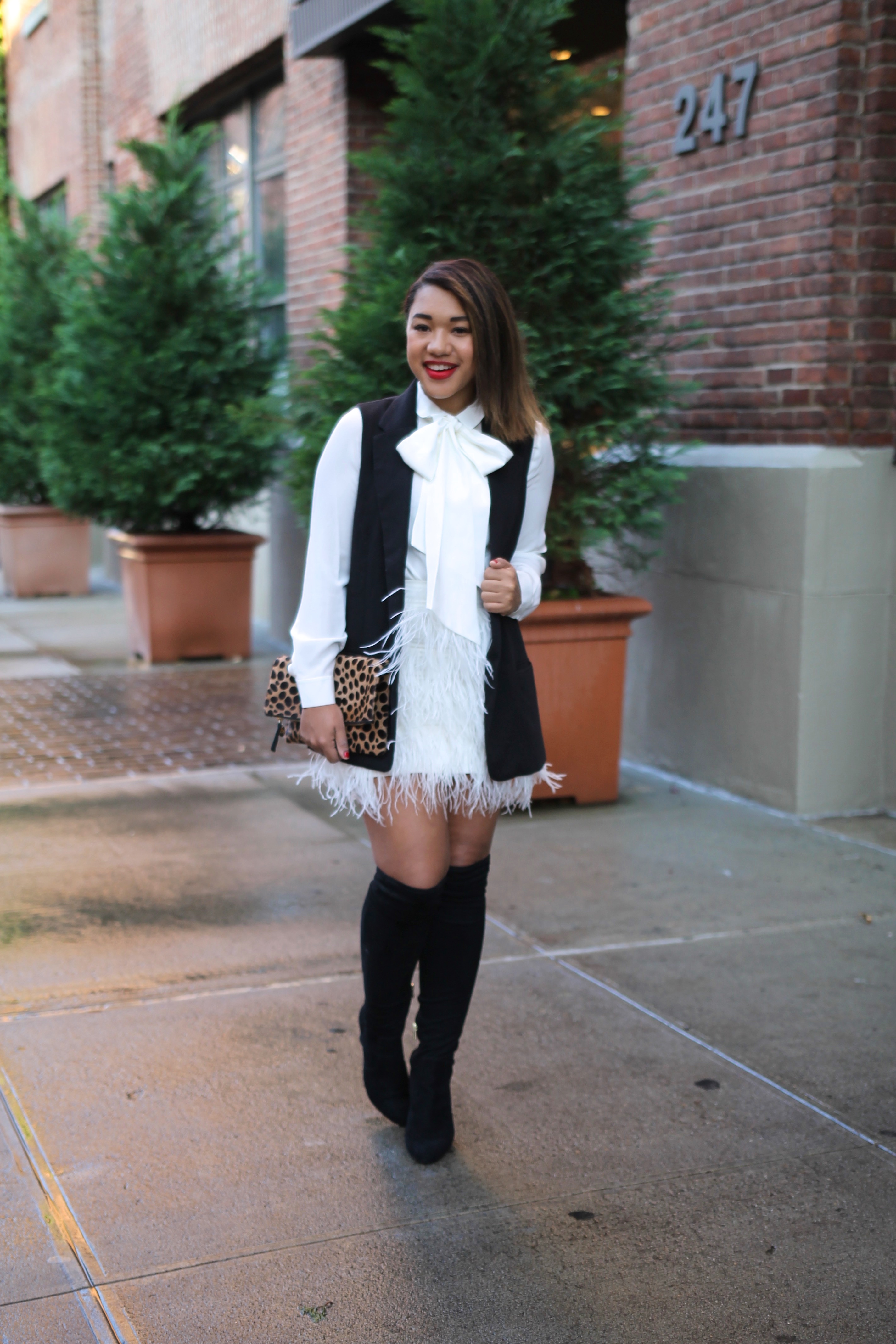 Holiday Style - White Feather Skirt / Bow Blouse / Leopard Clutch / Over the Knee Boots 